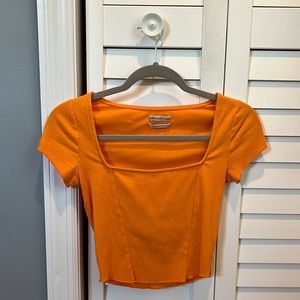 Urban Outfitters short sleeve orange top